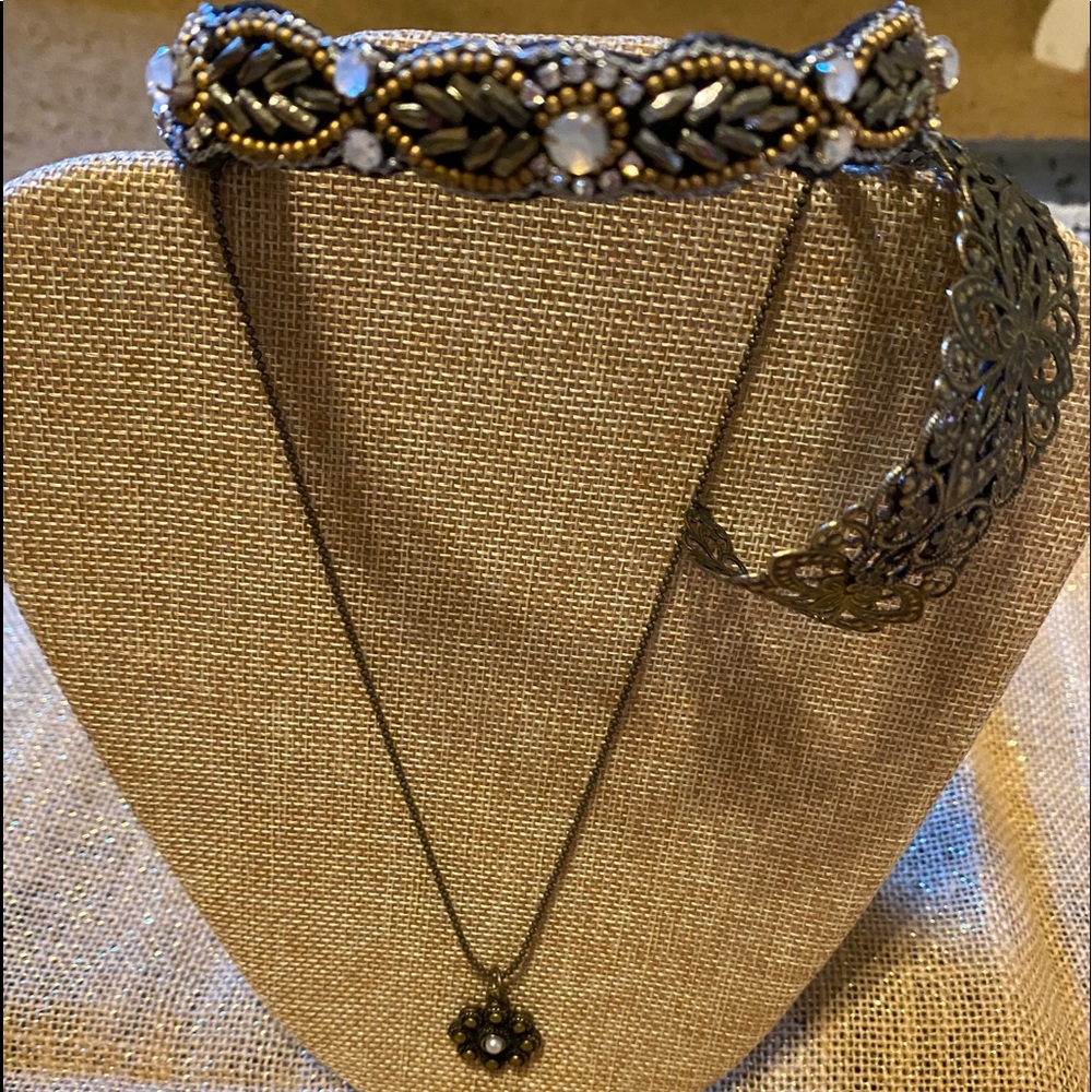 A choker, necklace and bracelet